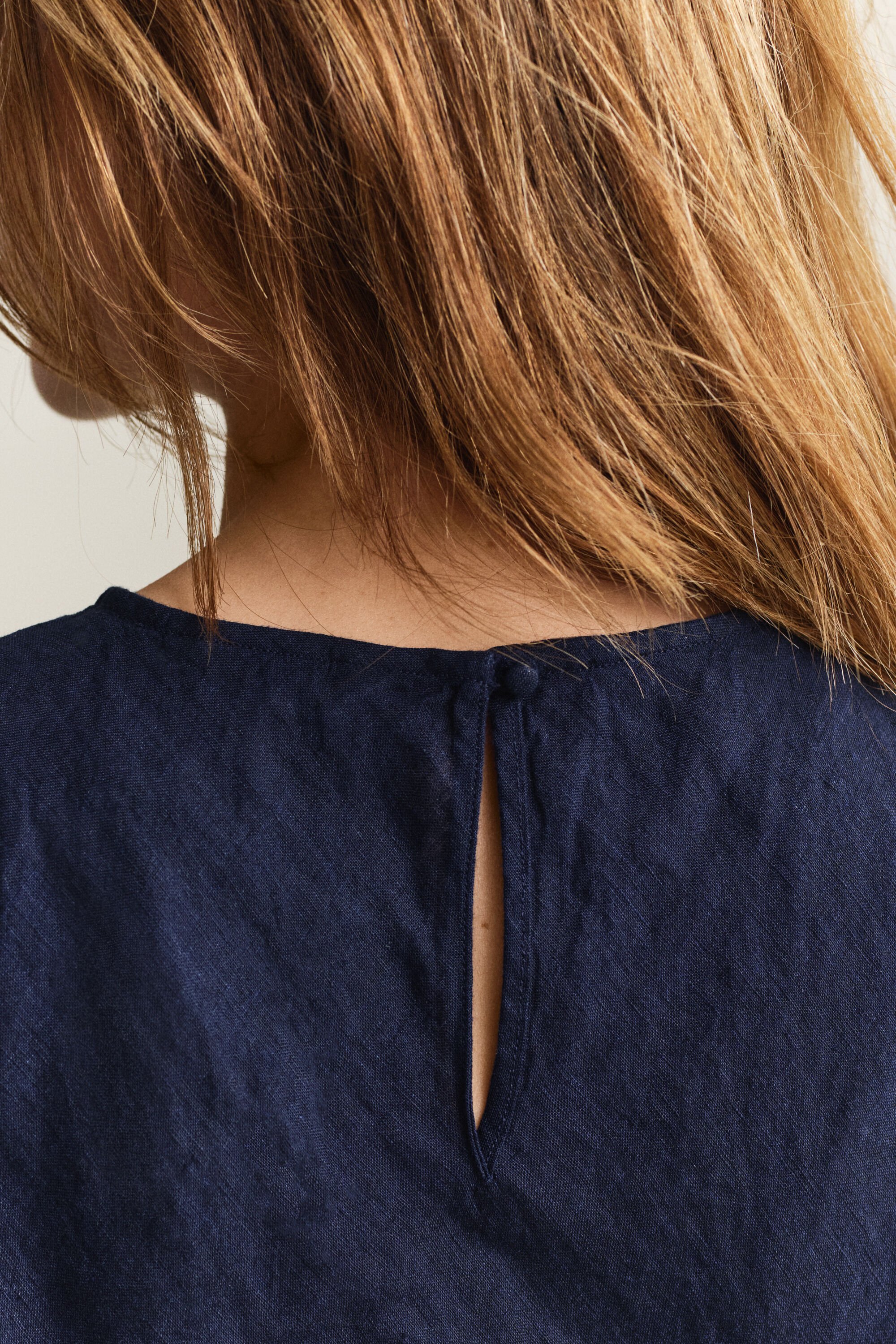 Snedskuren midiklänning i linne