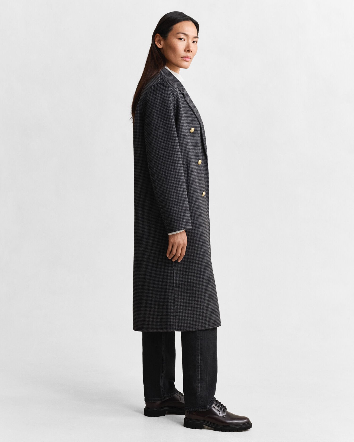 Rutig kappa med handsydda detaljer