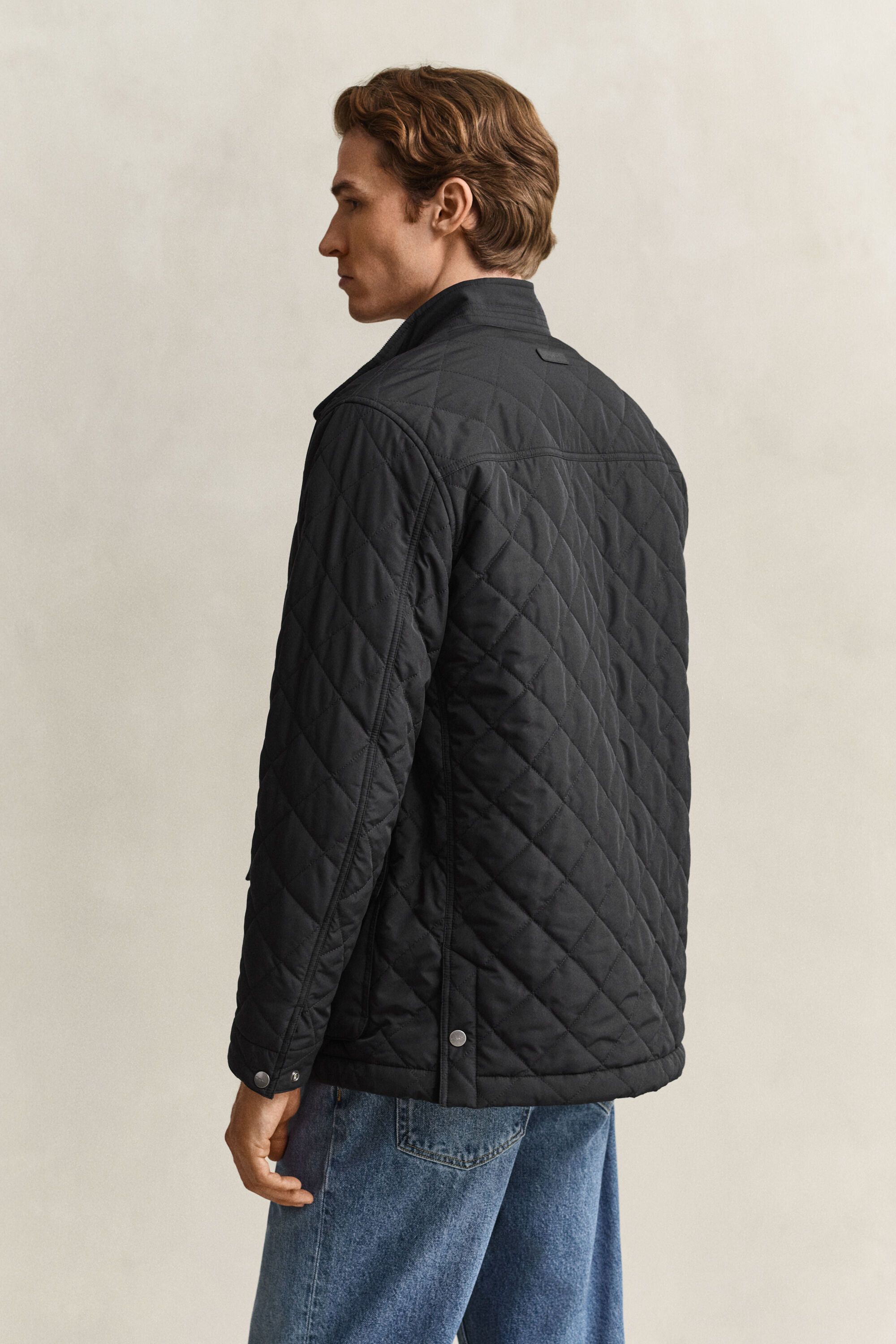 Quiltad medellång jacka
