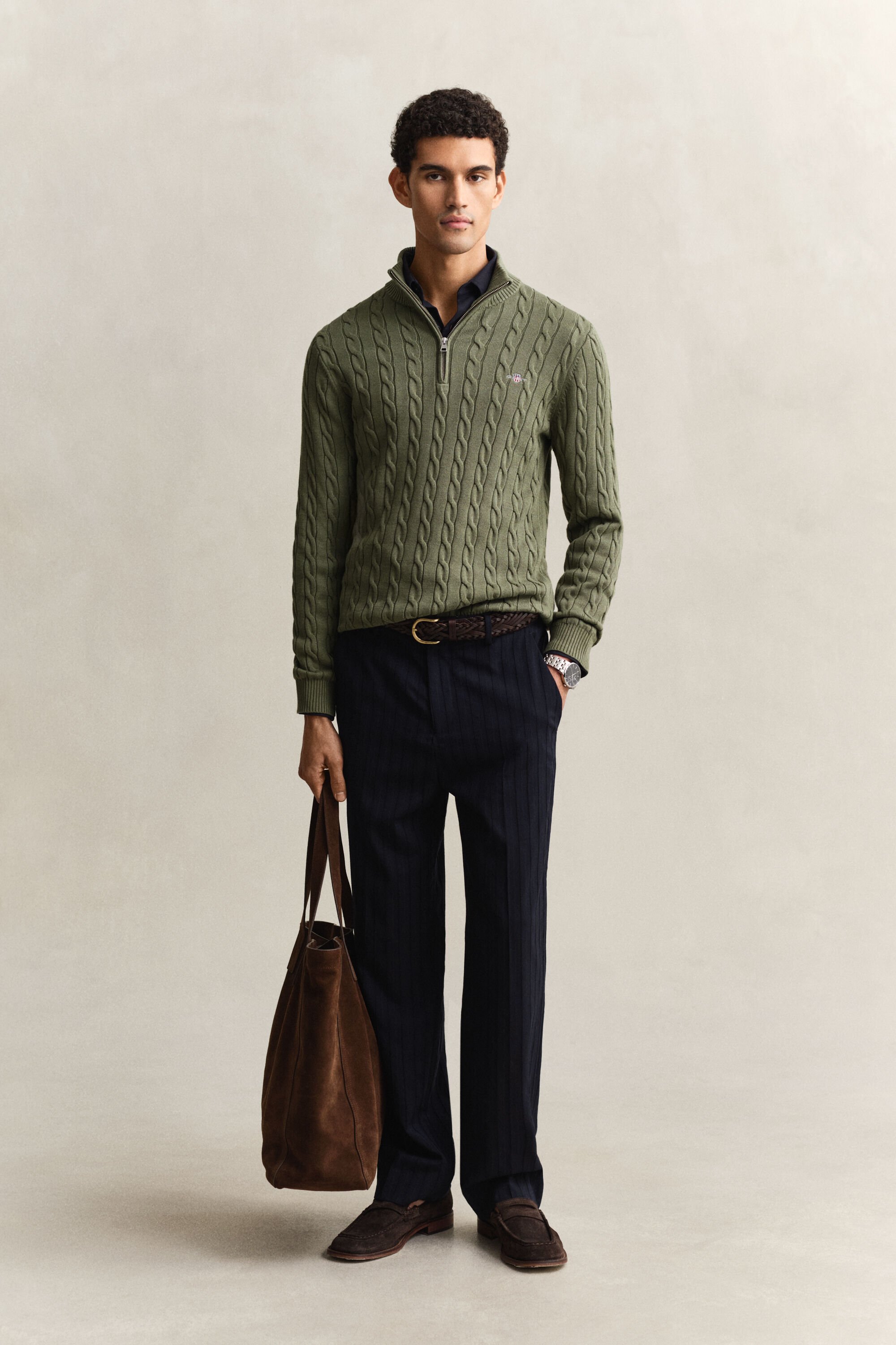 Kabelstickad bomullströja med dragkedja vid halsöppningen