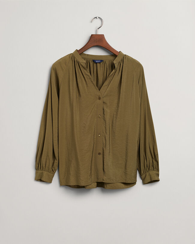 Blus med st&aring;krage