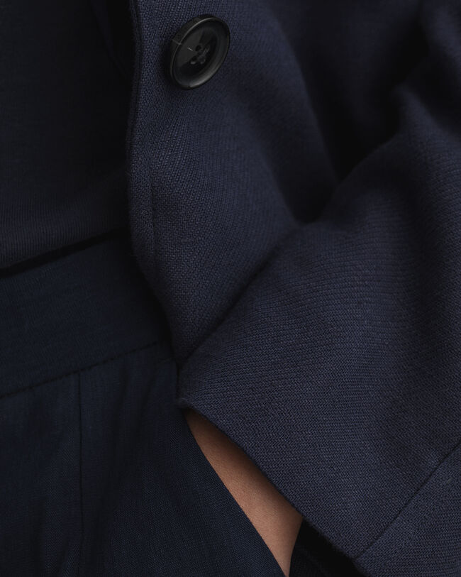 Fluid kappa i linneblandning med b&auml;lte