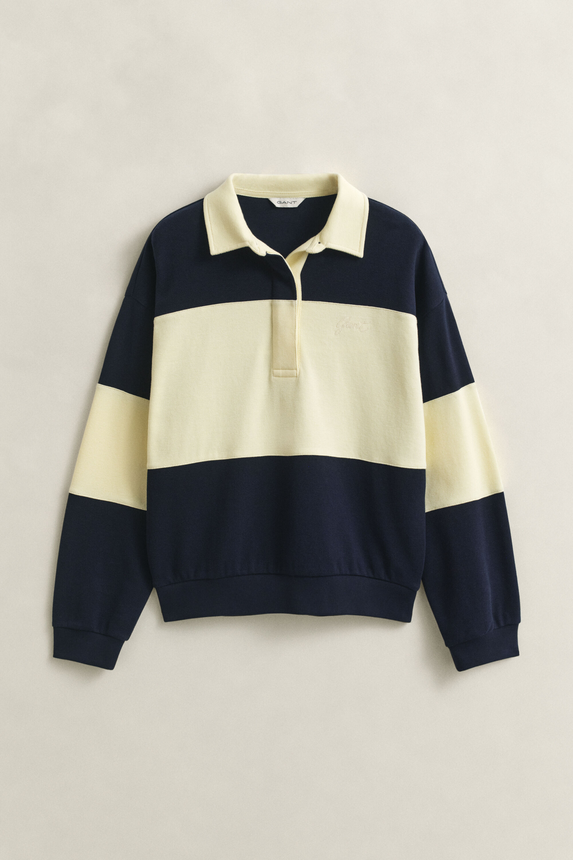 Rugger i pikéstruktur med färgblock