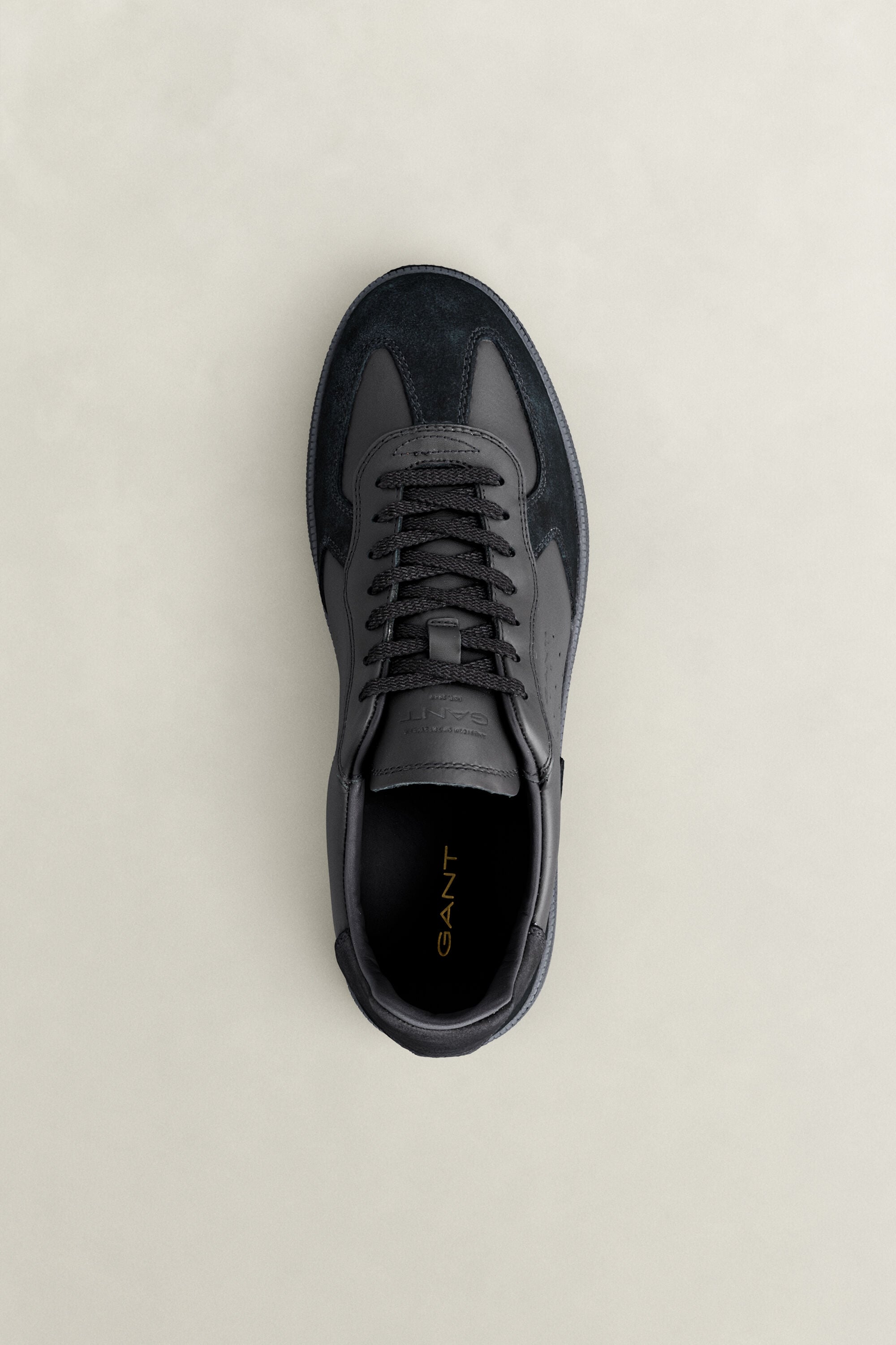 Cuzmo sneakers i läder och mocka