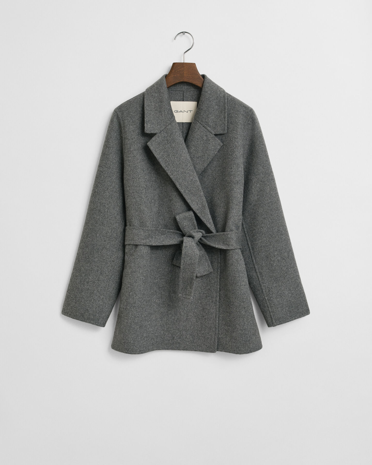 Handsydd jacka med bälte