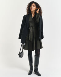 Långärmad klänning i bomullssatin