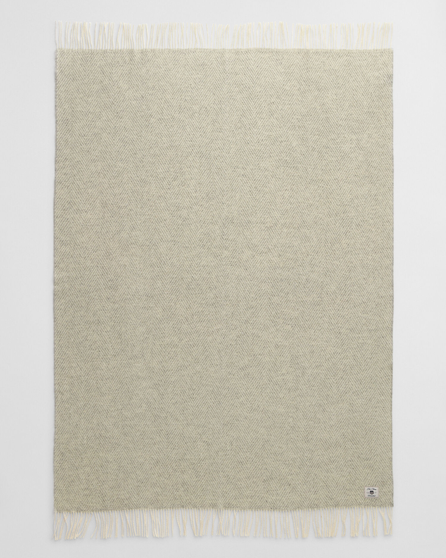 Fiskbensmönstrad yllepläd