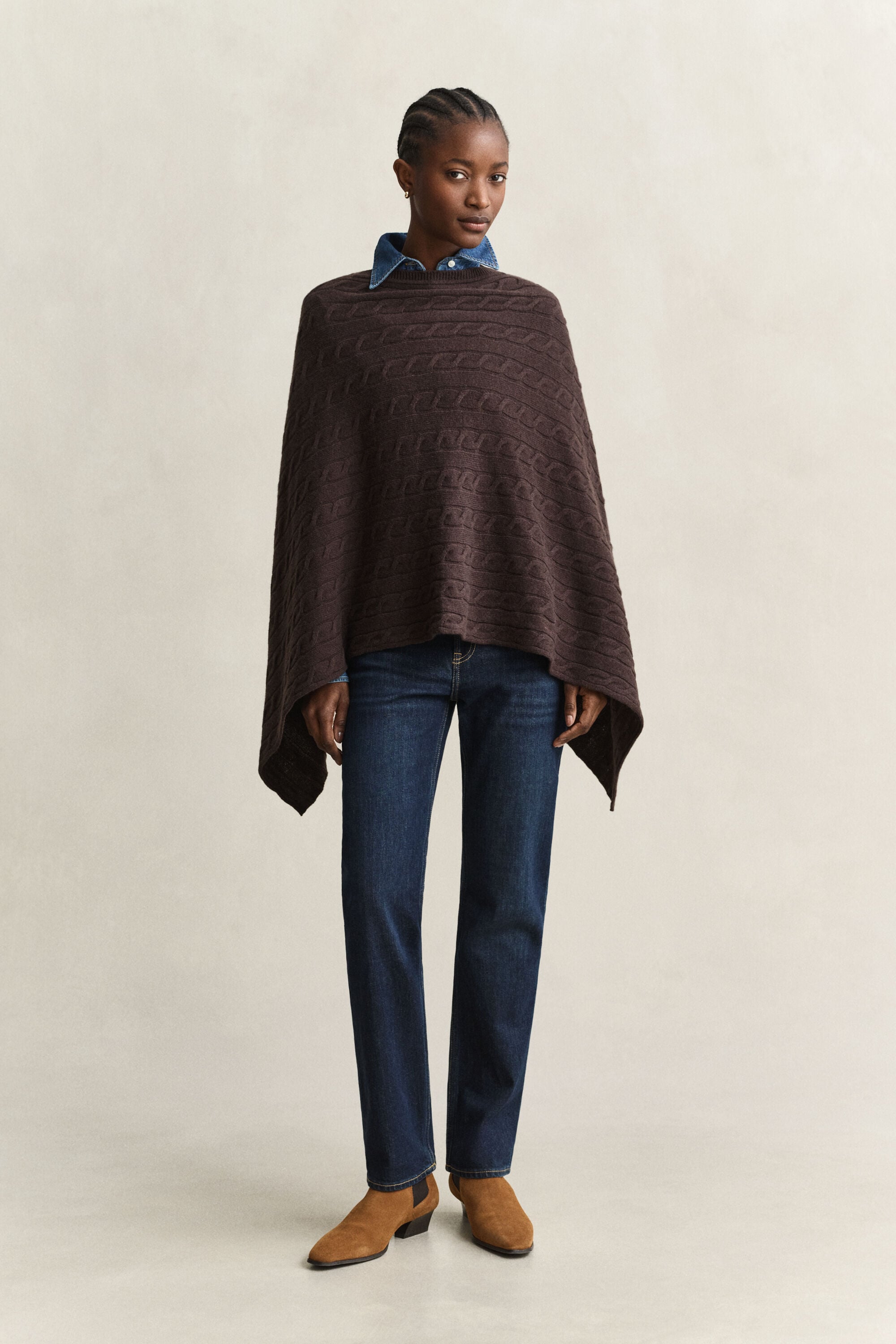Kabelstickad ylleponcho