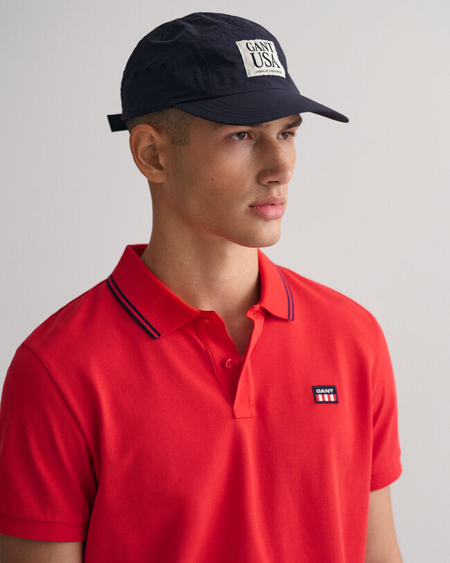 Randig pikétröja med kontrasterande krage