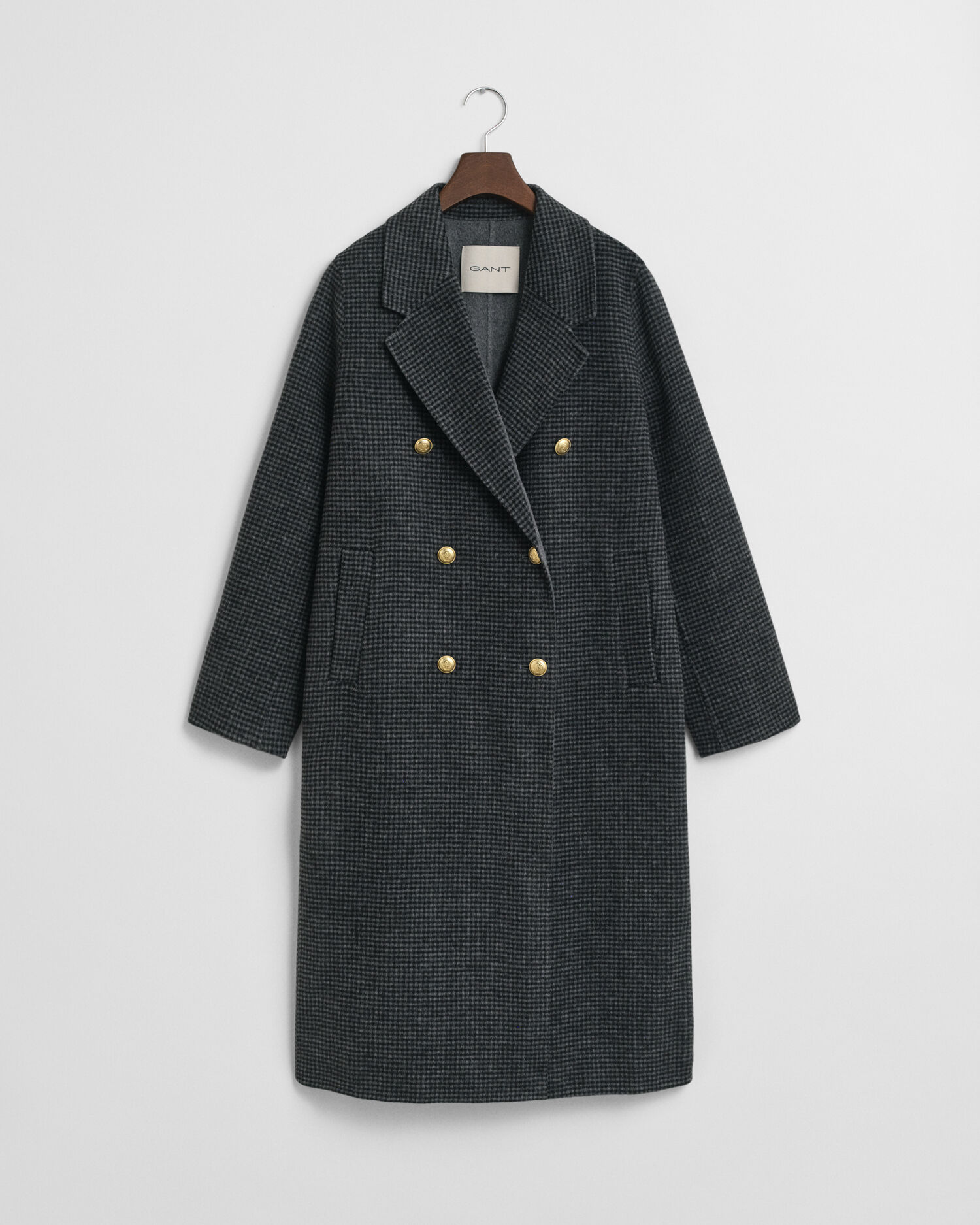 Rutig kappa med handsydda detaljer