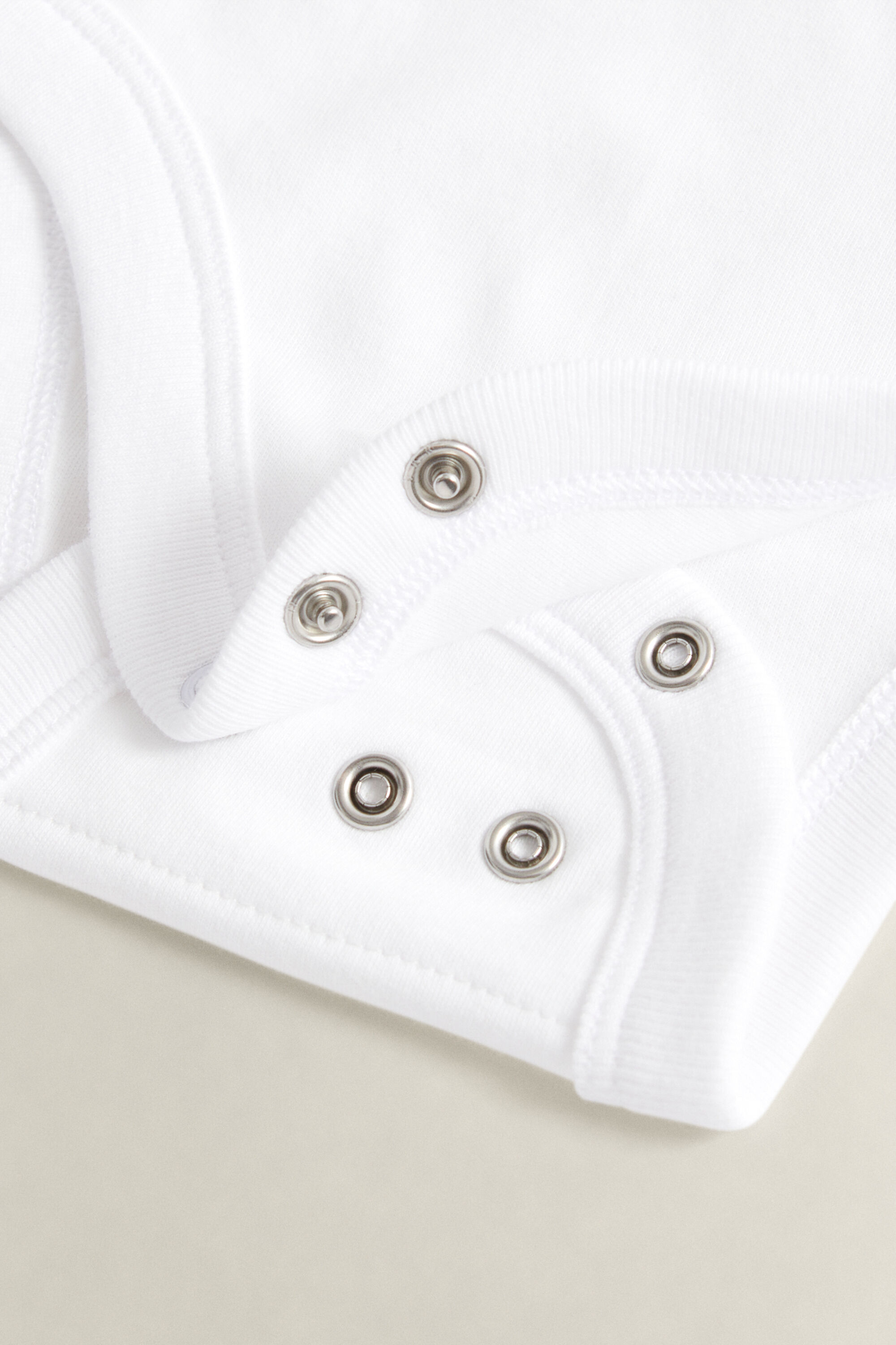 Baby set med sparkdräkt och mössa