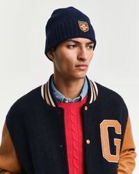 Yllemössa med märke