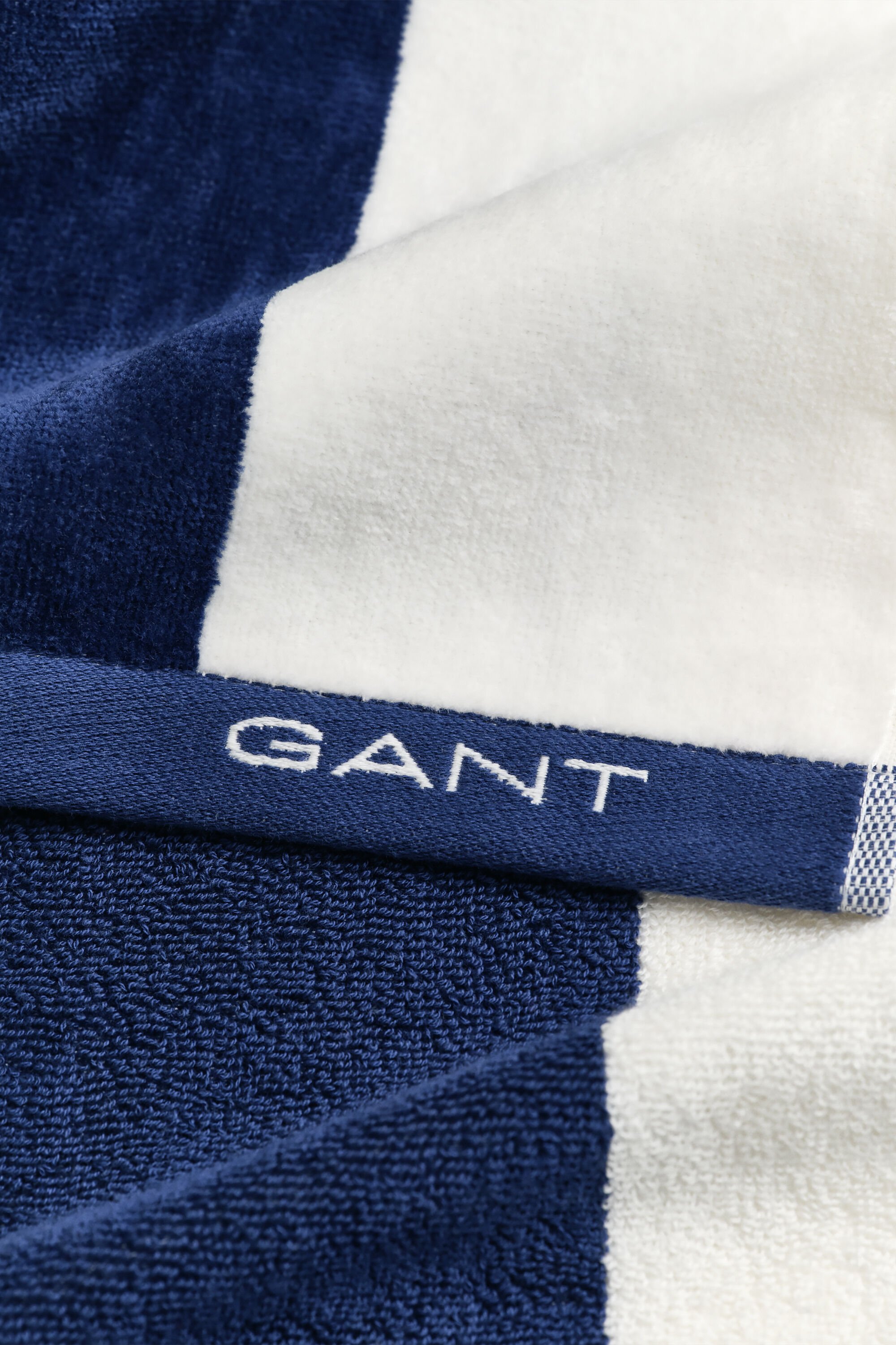 Bredrandig strandhandduk