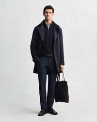 Kabelstickad bomullströja med dragkedja vid halsöppningen