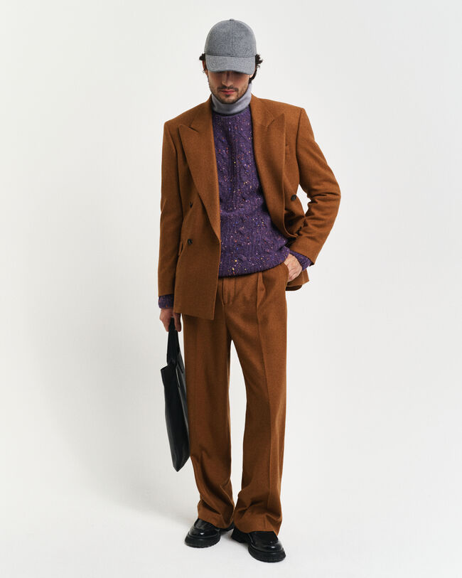 Kabelstickad tröja i bouclé