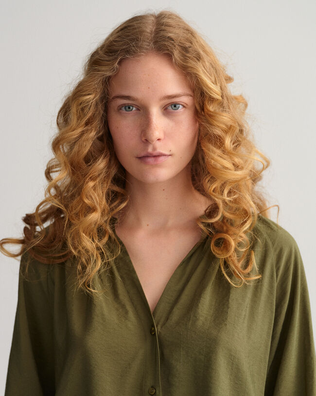 Blus med st&aring;krage