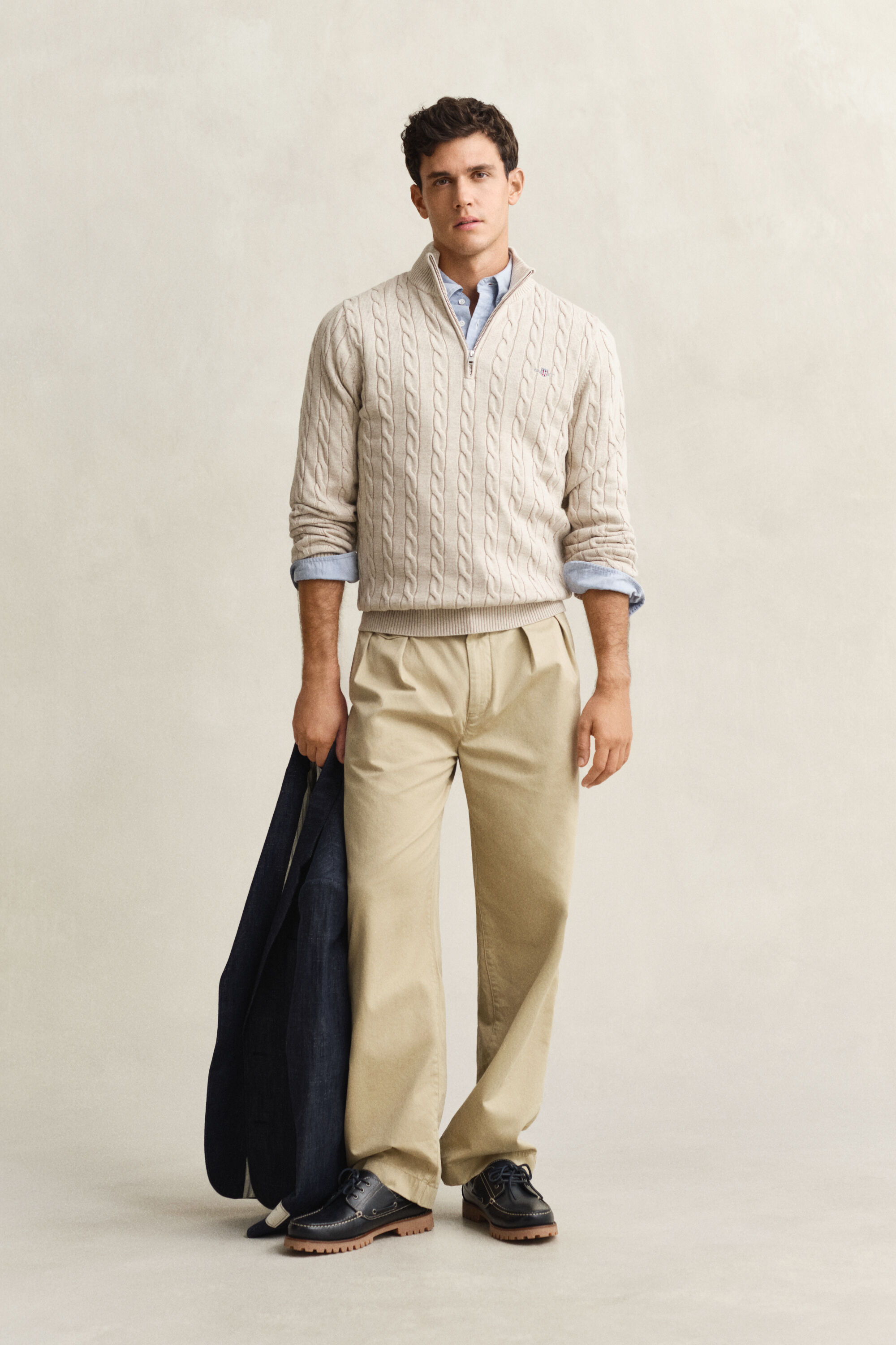 Kabelstickad bomullströja med dragkedja vid halsöppningen