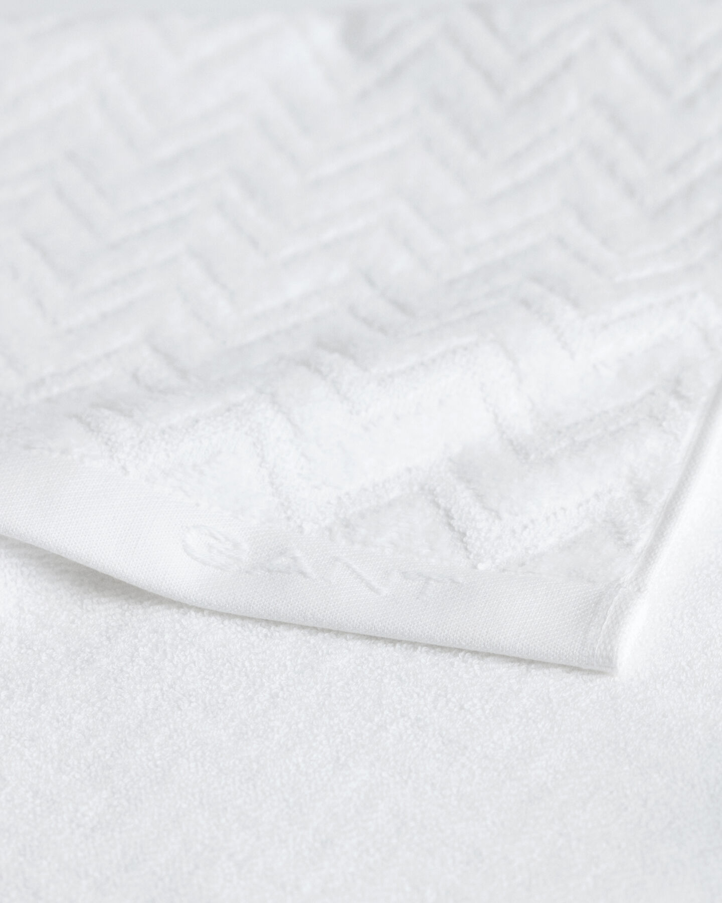 Jacquardvävd fiskbensmönstrad handduk 50 x 70