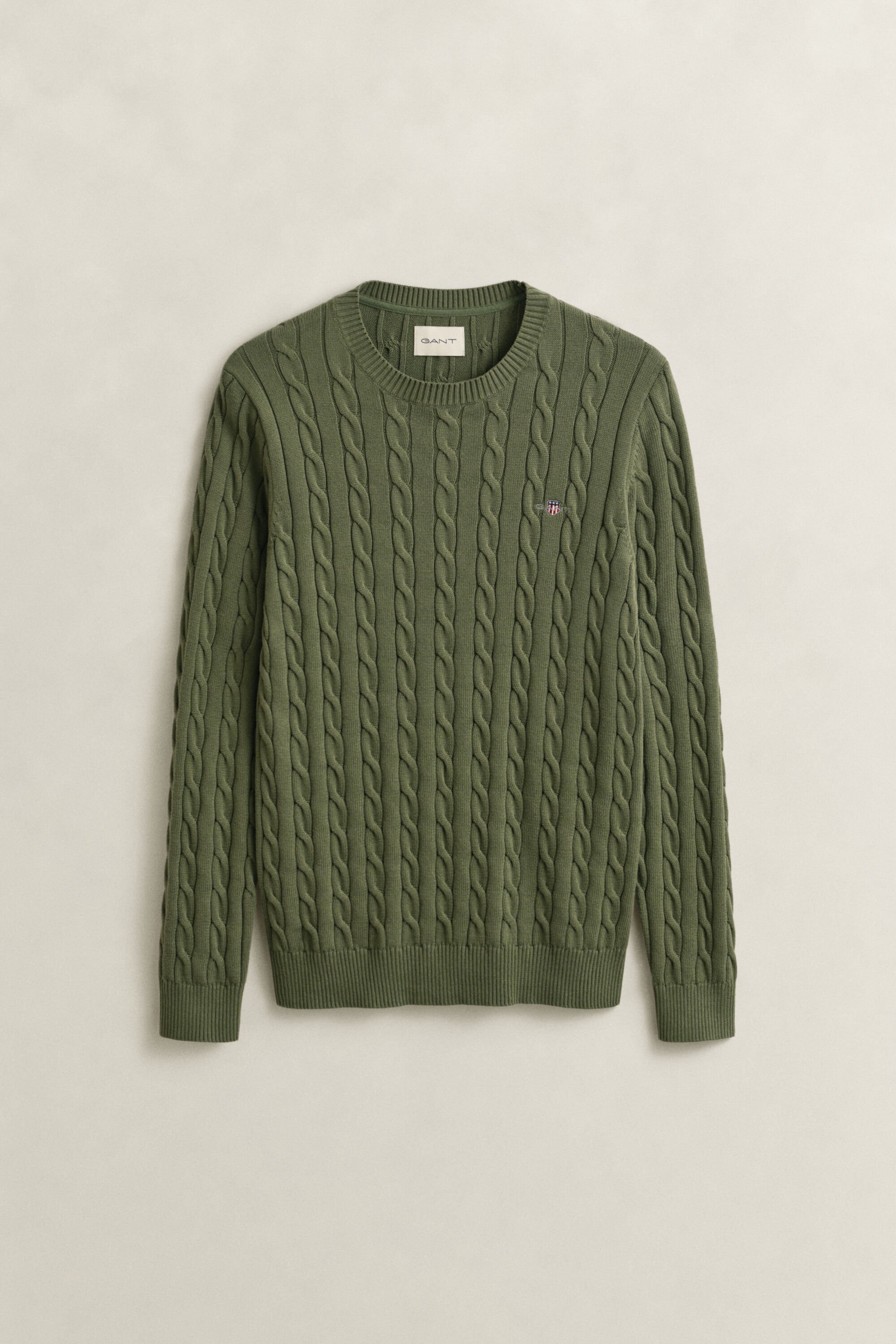 Kabelstickad bomullströja med rund hals