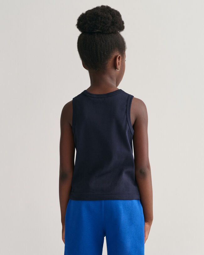 Kids linne med sk&ouml;ldemblem