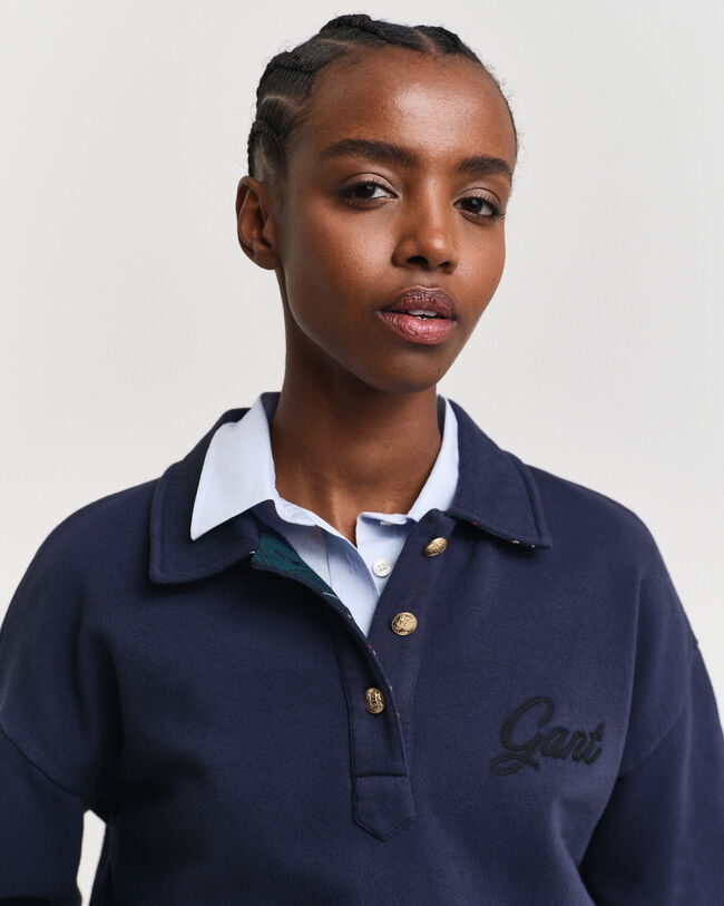 Rugger sweatshirt med text i kursiv