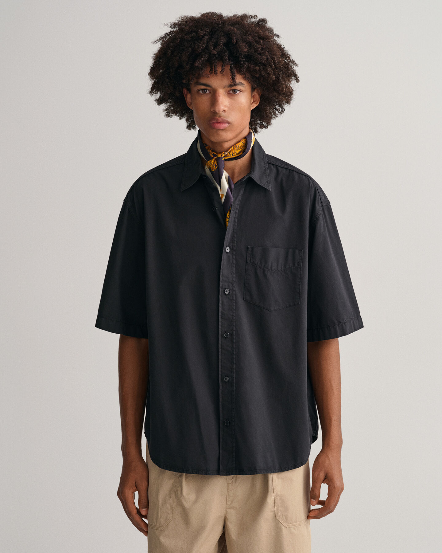 Oversized, solblekt kort&auml;rmad skjorta