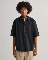 Oversized, solblekt kort&auml;rmad skjorta