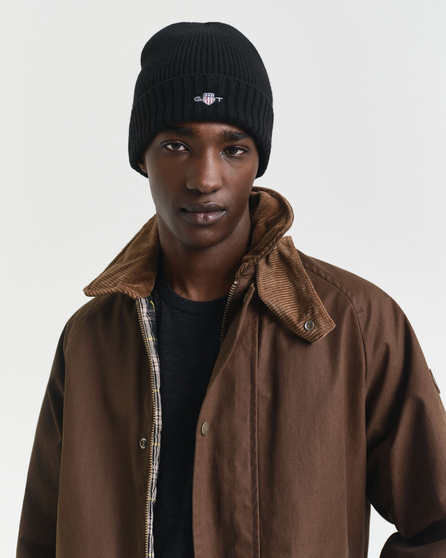 Yllemössa med sköld