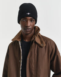 Yllemössa med sköld