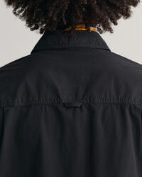 Oversized, solblekt kort&auml;rmad skjorta