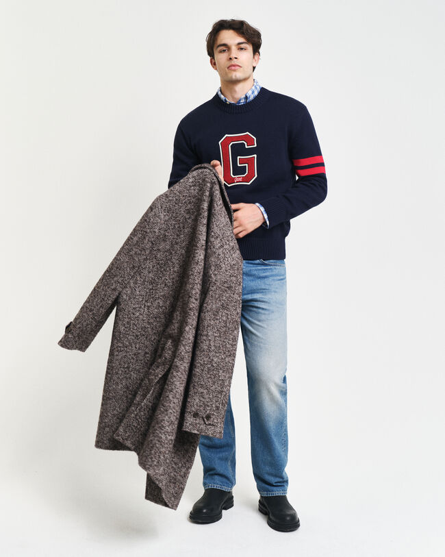 Rundhalsad tröja med säsongens motiv