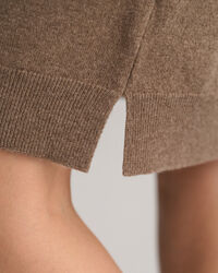 Kl&auml;nning i fin lammull