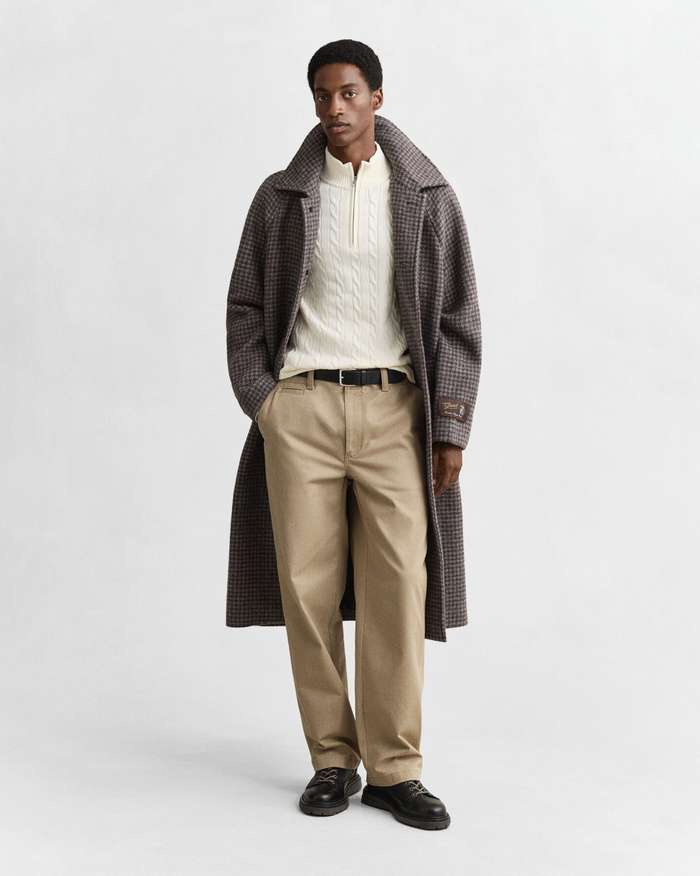 Kabelstickad bomullströja med dragkedja vid halsöppningen