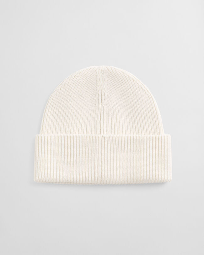 Ribbstickad mössa i ull