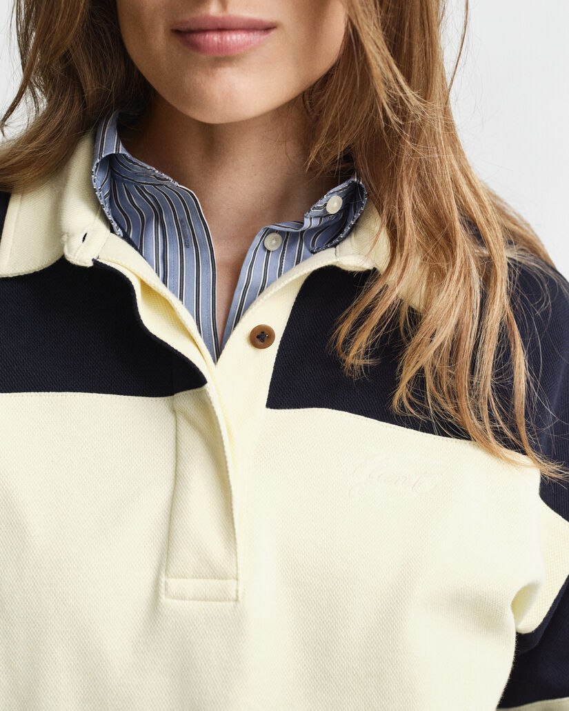 Rugger i pikéstruktur med färgblock