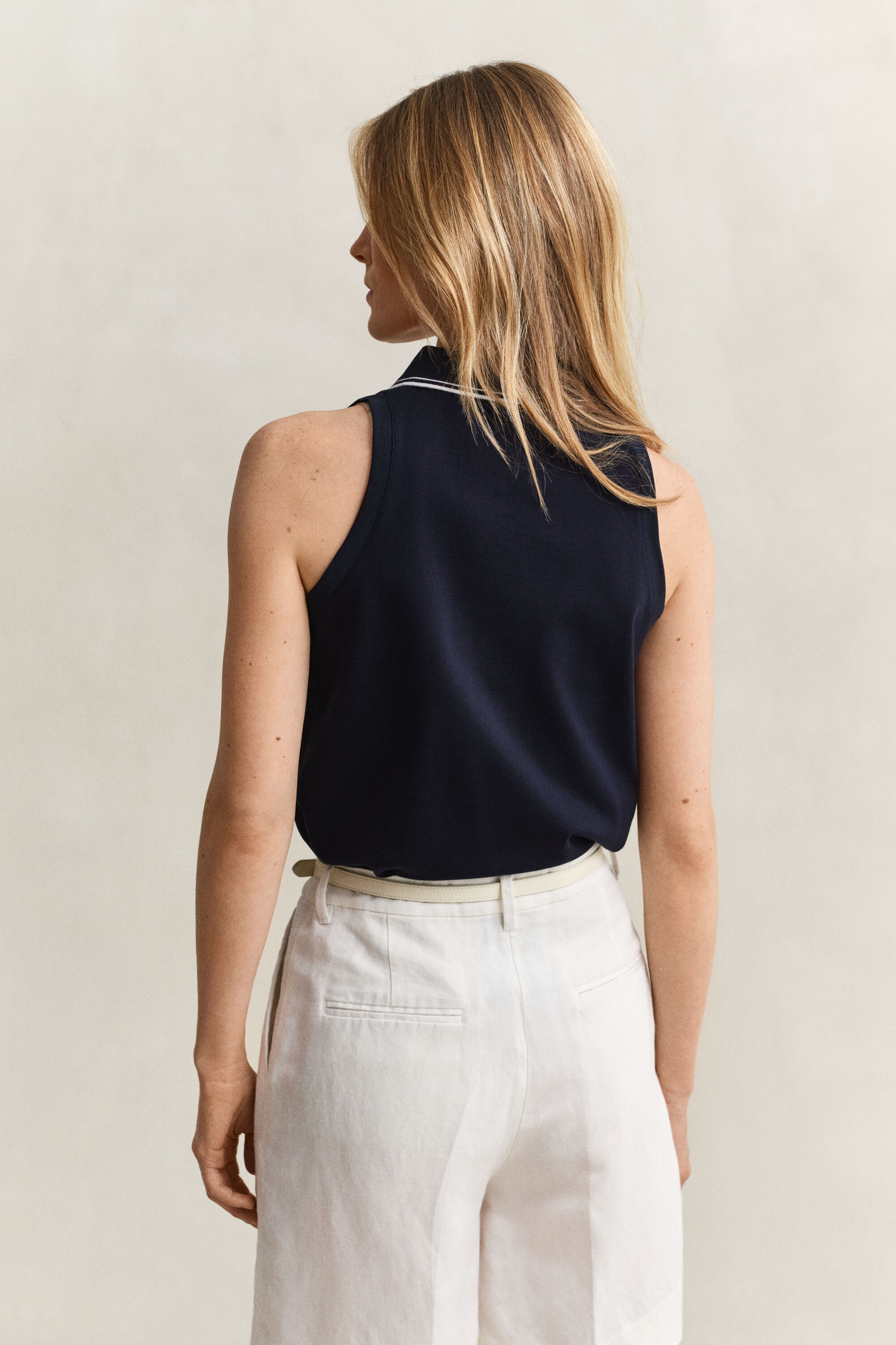 Ärmlös pikétröja