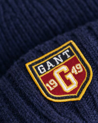 Yllemössa med märke