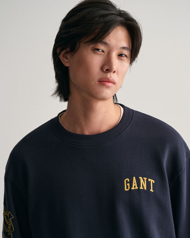 Rundhalsad sweatshirt med drakemblem