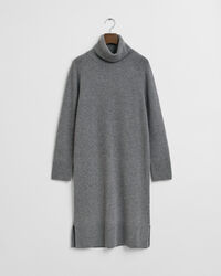 Klänning med polokrage och stickade detaljer