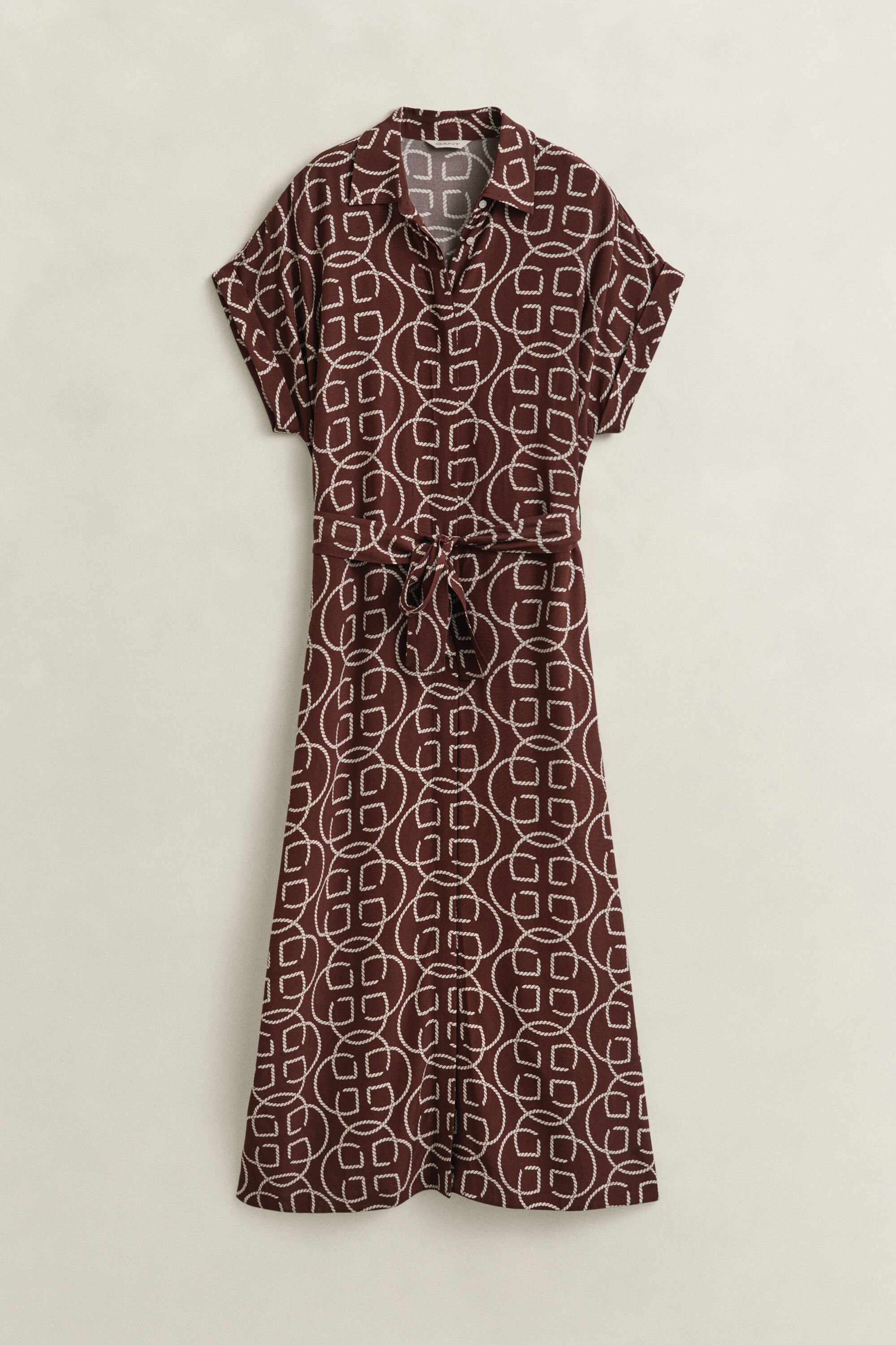 Klänning med holkärm och monogram