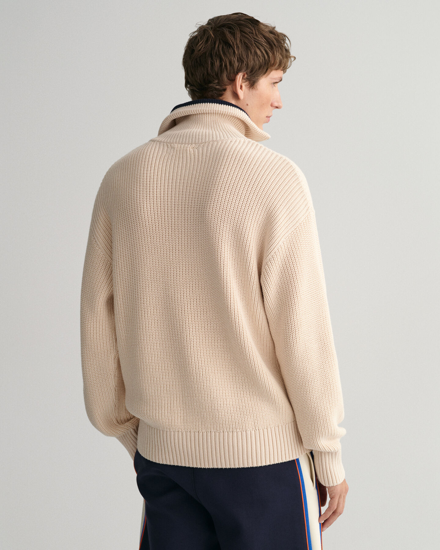 Ribbstickad half-zip tröja