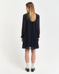 Prickig knytklänning