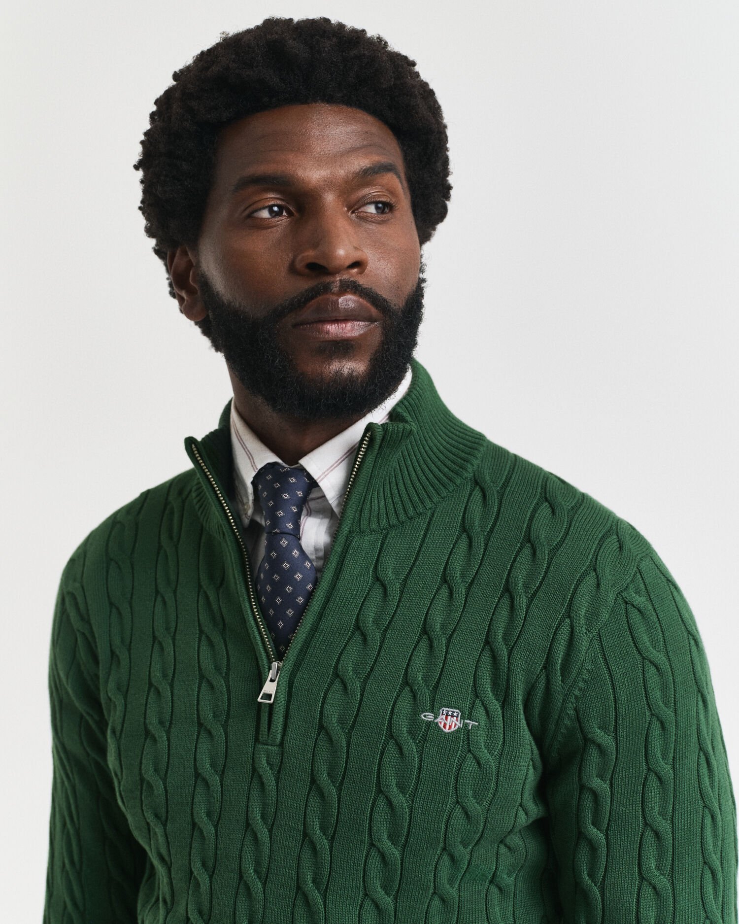 Kabelstickad bomullströja med dragkedja vid halsöppningen