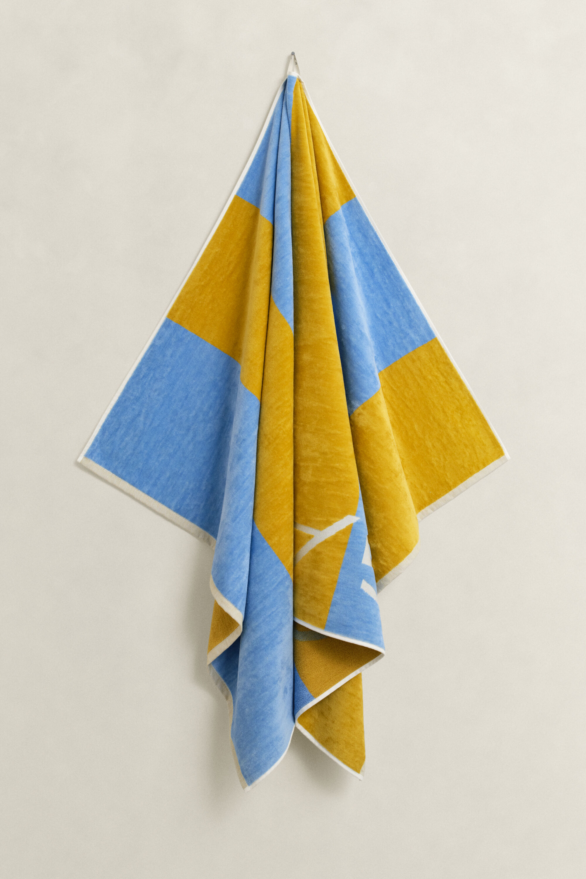 Strandhandduk med blockränder