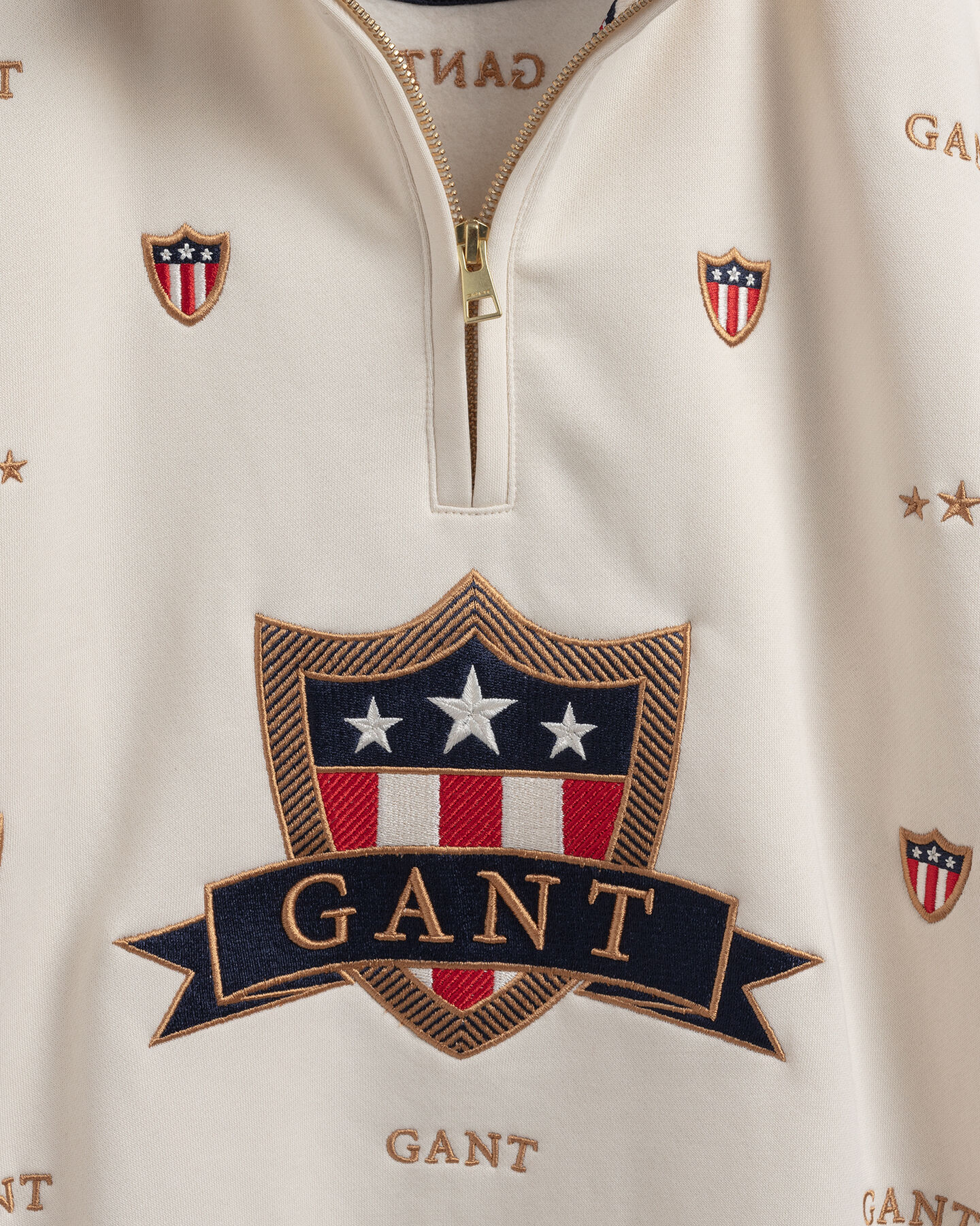 Teens Banner Shield tr&ouml;ja med halvl&aring;ng dragkedja