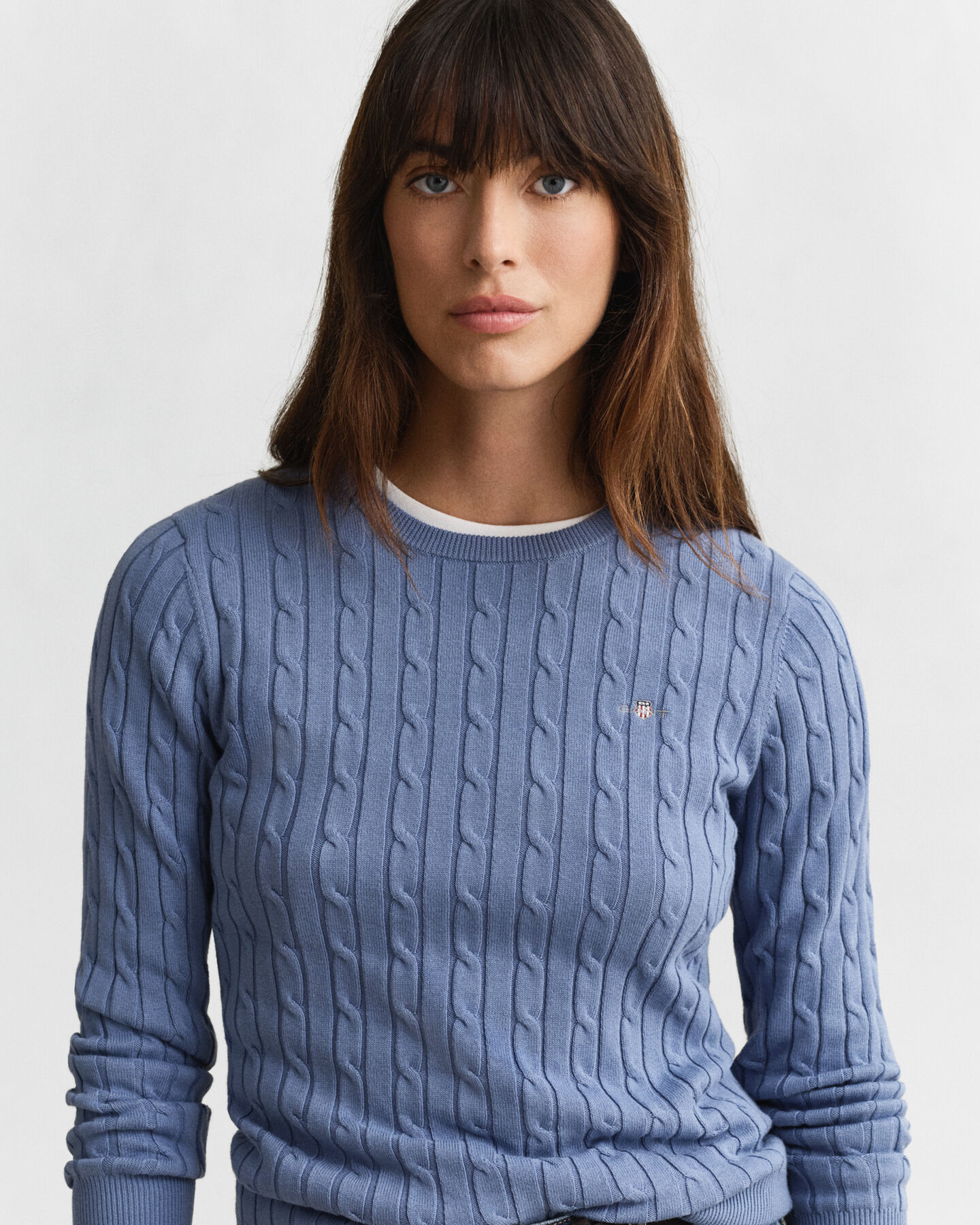 Kabelstickad tröja i bomullsstretch med rund hals