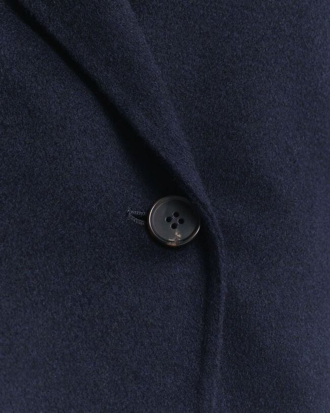 Handsydd jacka med bälte