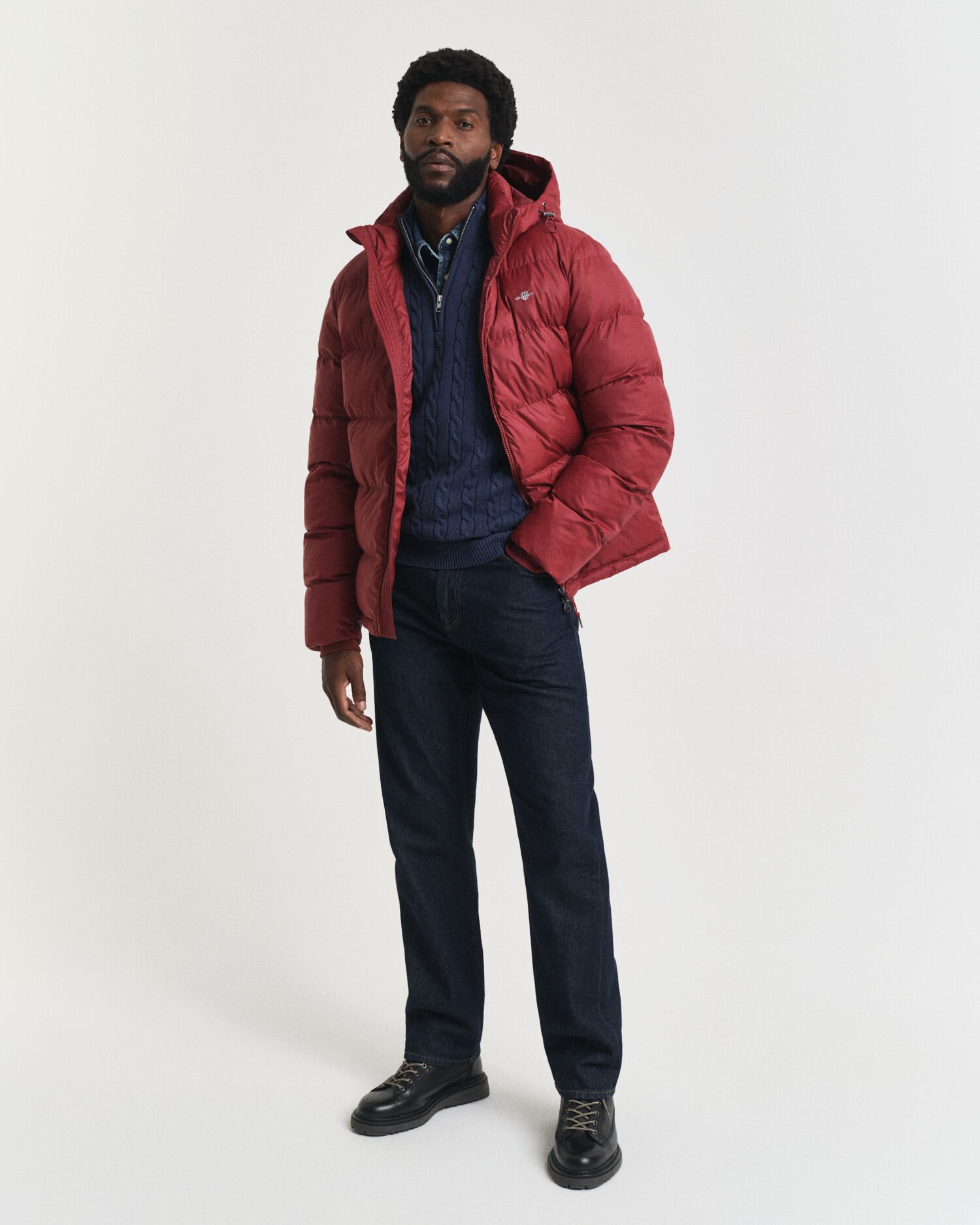 Kabelstickad bomullströja med dragkedja vid halsöppningen