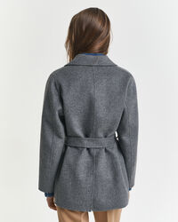 Handsydd jacka med bälte