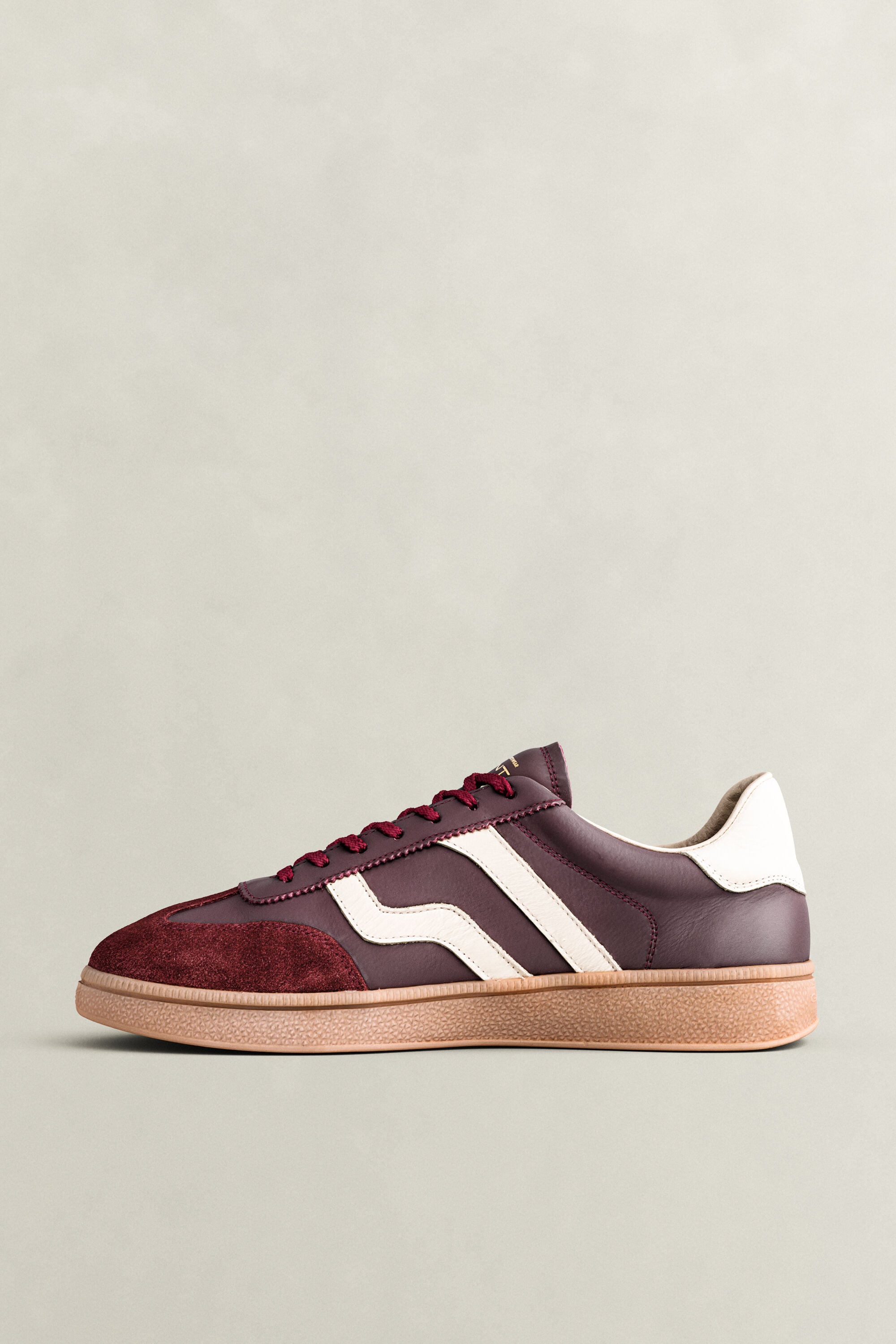 Cuzmo sneakers i läder och mocka